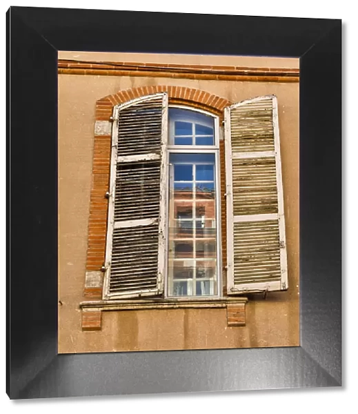 France, Toulouse. Window and shutters in the streets of Toulouse