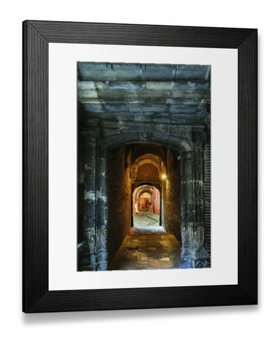 Framed Print : France, Toulouse. Tunnel leading to a courtyard