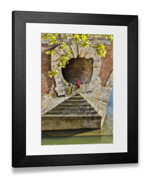 Framed Print : France, Toulouse. Red Devil sitting in opening of the Pont Neuf (Bridge) Framed Print : France, Toulouse. Red Devil sitting in opening of the Pont Neuf (Bridge)