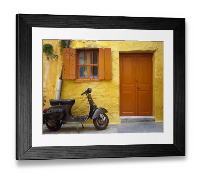 Framed Print : Greece, Rhodes. Vespa motorbike and colorful house exterior