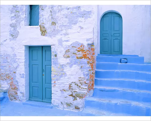 Greece, Symi. Blue doors and stairway of house