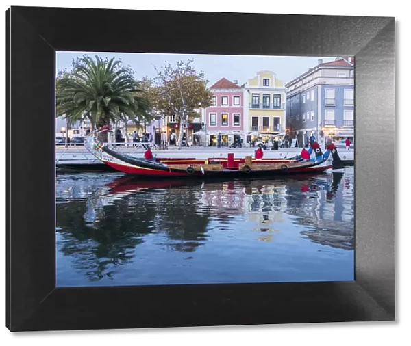 Portugal, Aveiro. Moliceiro boat on the canal