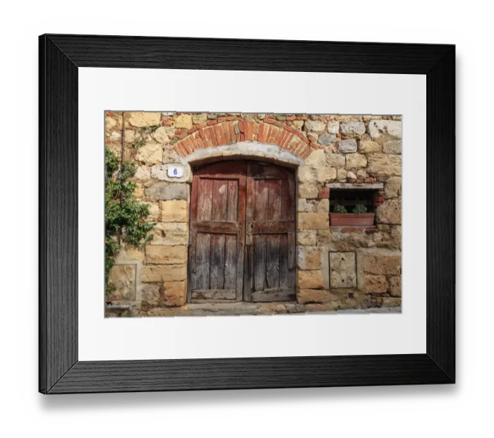 Framed Print : Italy, Monteriggioni. Stone wall, wooden door with planted geraniums Framed Print : Italy, Monteriggioni. Stone wall, wooden door with planted geraniums