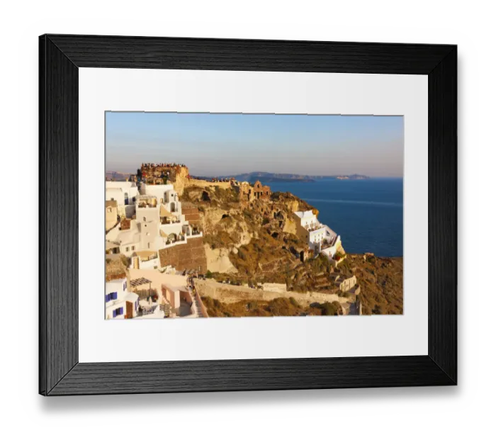 Framed Print : Old fortress and houses on the coast of Aegean Sea. Oia, Santorini Island, Greece Framed Print : Old fortress and houses on the coast of Aegean Sea. Oia, Santorini Island, Greece