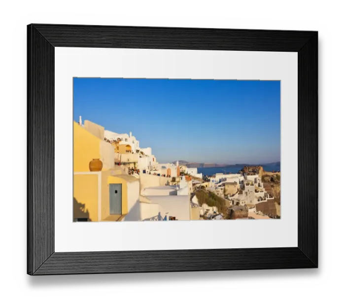 Framed Print : Old fortress and houses on the coast of Aegean Sea. Oia, Santorini Island, Greece Framed Print : Old fortress and houses on the coast of Aegean Sea. Oia, Santorini Island, Greece