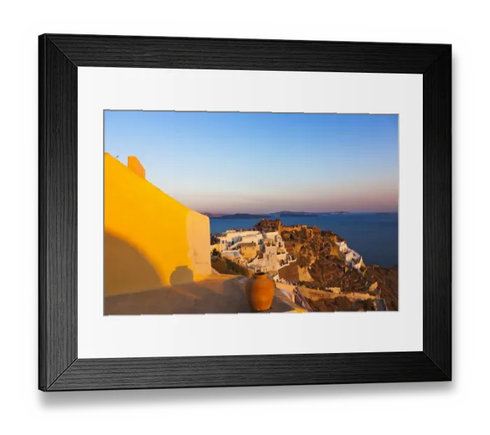 Framed Print : Old fortress and houses on the coast of Aegean Sea. Oia, Santorini Island, Greece Framed Print : Old fortress and houses on the coast of Aegean Sea. Oia, Santorini Island, Greece