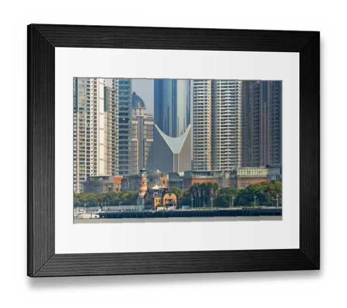Framed Print : High-rise and light house by Huangpu River in Pudong, Shanghai, China Framed Print : High-rise and light house by Huangpu River in Pudong, Shanghai, China