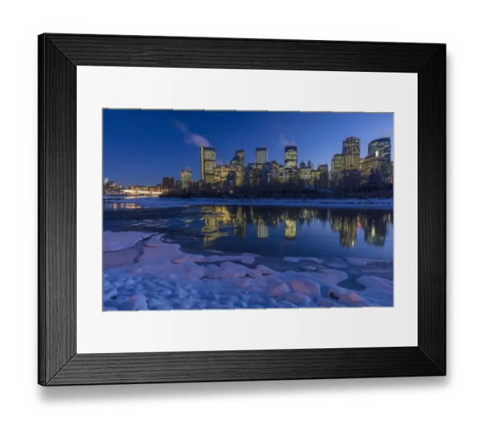 Framed Print : Winter city skyline reflects in the Bow River in Calgary, Alberta, Canada