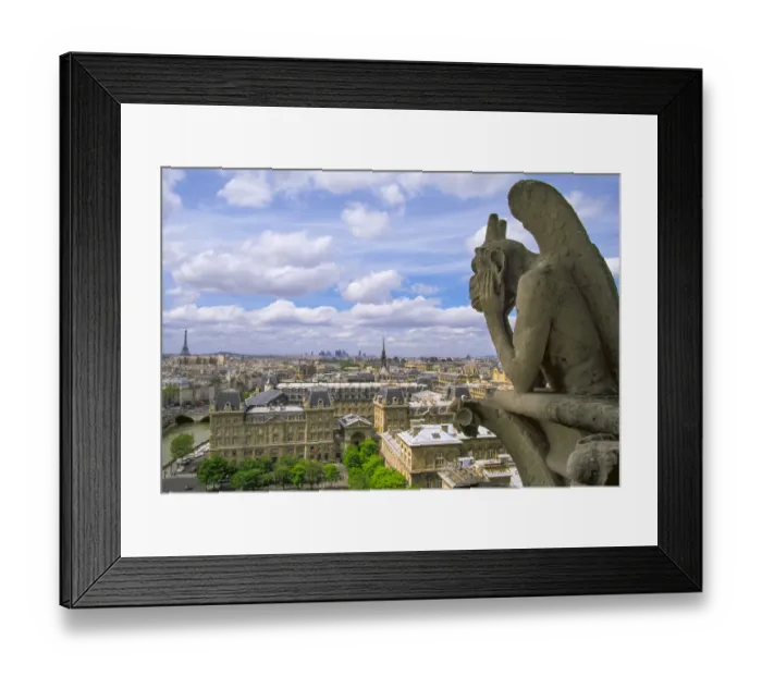 Framed Print : Gargoyle on the roof of Notre Dame cathedral looks out over Paris, France Framed Print : Gargoyle on the roof of Notre Dame cathedral looks out over Paris, France
