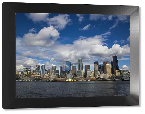 Seattle, Washington State. Skyline and waterfront with a ferry boat