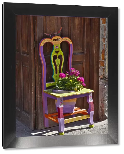 San Miguel De Allende, Mexico. Colorful painted chair planter
