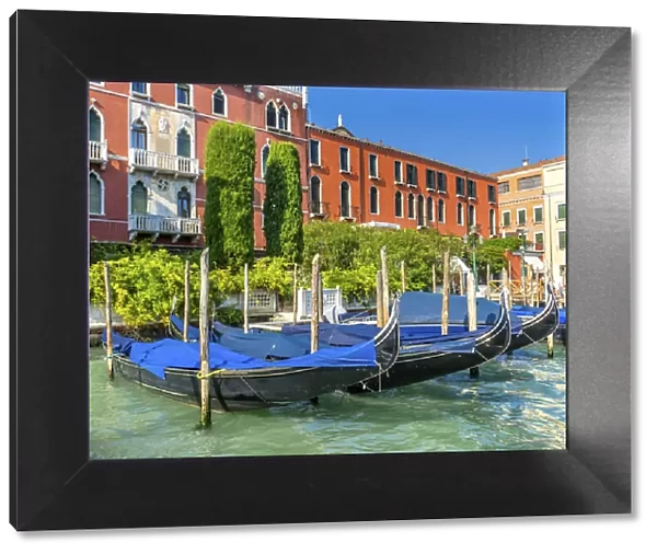 Colorful Grand Canal blue gondola reflections, Venice, Italy