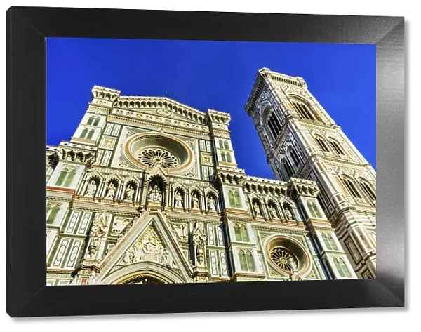 Cathedral di Santa Maria del Fiore facade, Florence, Italy. Baptistery was created in 1100 s