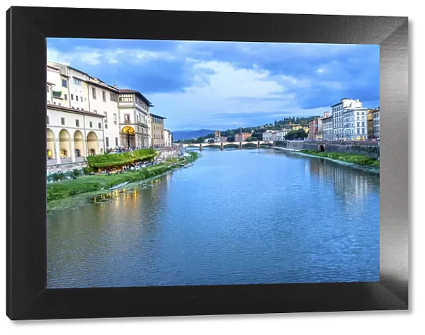 Arno River Ponte Alle Grazie evening, Florence, Italy. View from Ponte Vecchio
