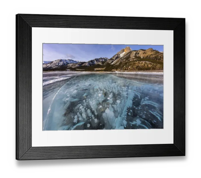 Framed Print : Mount Abraham at sunrise with methane ice bubbles under clear ice on Abraham Lake near Nordegg Framed Print : Mount Abraham at sunrise with methane ice bubbles under clear ice on Abraham Lake near Nordegg