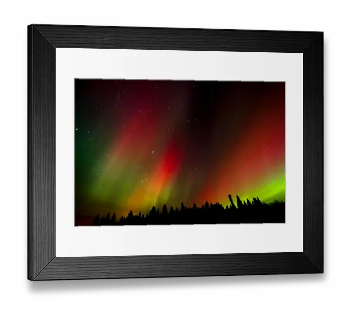Framed Print : Canada, Manitoba, Birds Hill Provincial Park. Aurora borealis and trees. Credit as