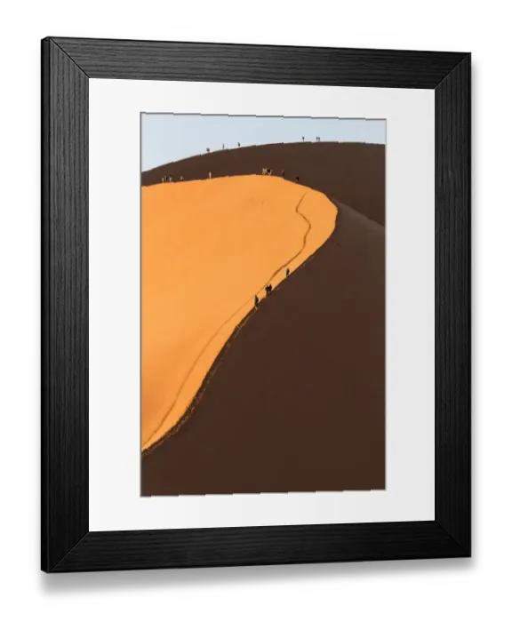Framed Print : Africa, Namib Desert. Hikers climbing the red sand dune in Namibia Framed Print : Africa, Namib Desert. Hikers climbing the red sand dune in Namibia