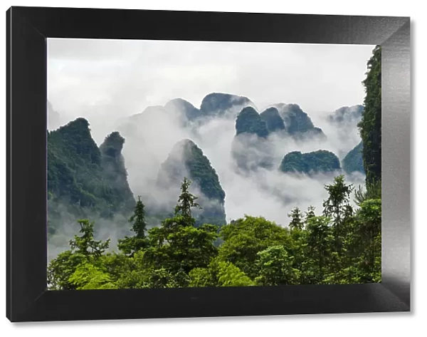 Limestone hills in mist, Yangshuo, Guangxi, China