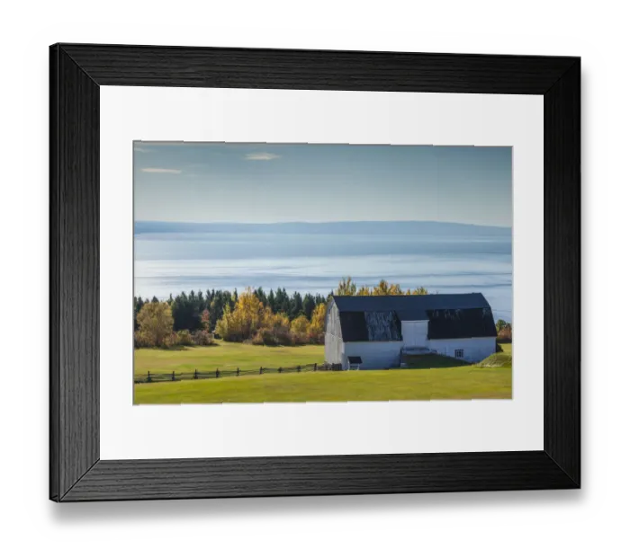 Framed Print : Canada, Quebec, Sainte Irenee. Elevated view of farm and St. Lawrence River