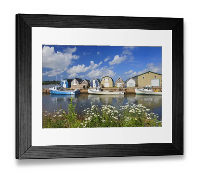 Framed Print : Canada, Prince Edward Island, New London. Fishing boats and sheds in coastal village
