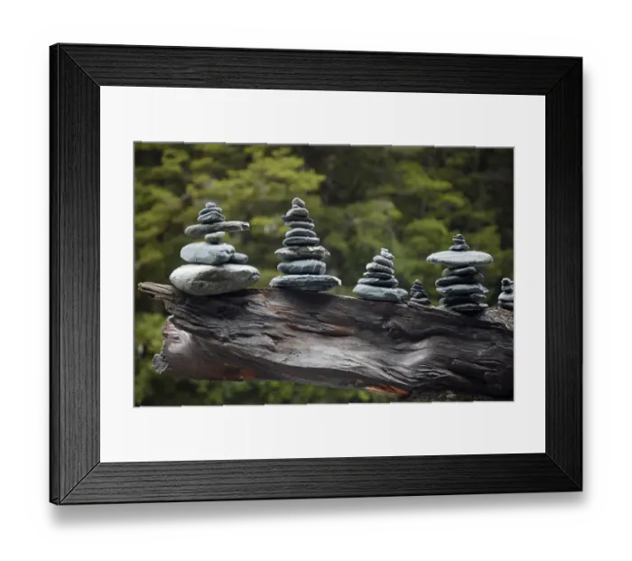 Framed Print : Rock stacks made by tourists by Fantail Falls, Hst Pass, Mt. Aspiring National Park