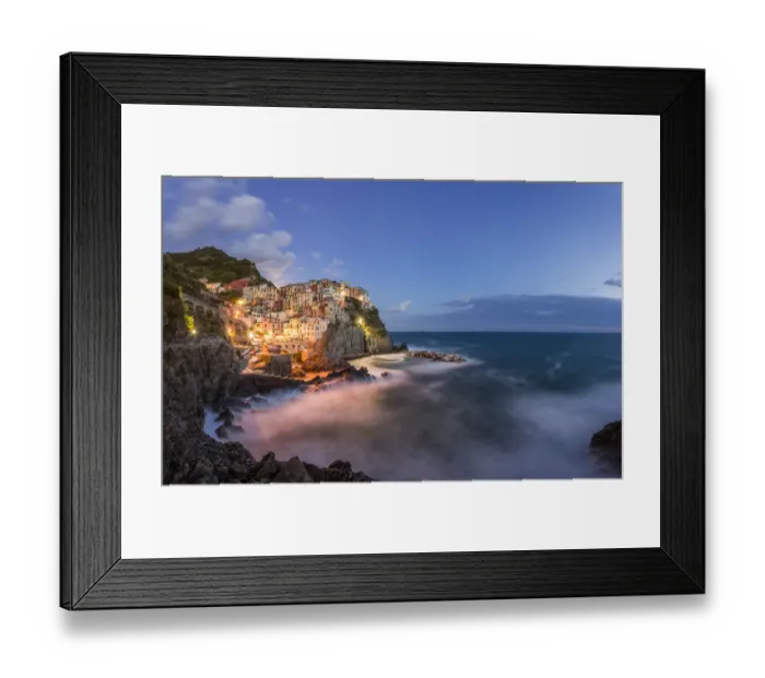 Framed Print : Italy, Cinque Terre, Manarola. Hilltop town and stormy ocean at sunset. Credit as