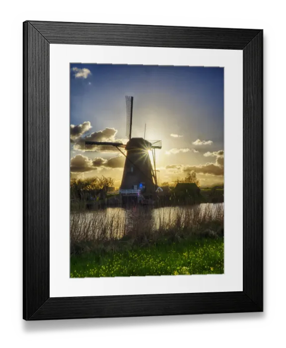 Framed Print : Netherlands, Kinderdijk. Windmill along the canal at sunset