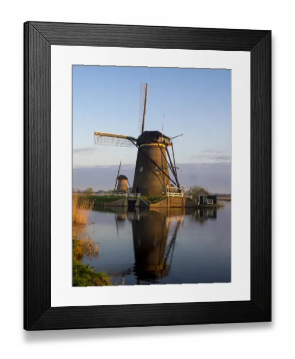 Framed Print : Netherlands, Kinderdijk. Windmill along the canal with morning light Framed Print : Netherlands, Kinderdijk. Windmill along the canal with morning light