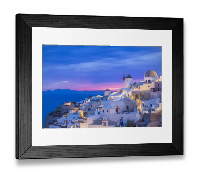Framed Print : Europe, Greece, Oia. Greek Orthodox church and village at sunset