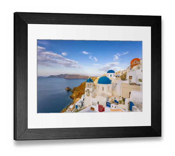 Framed Print : Europe, Greece, Oia. Greek Orthodox church and village
