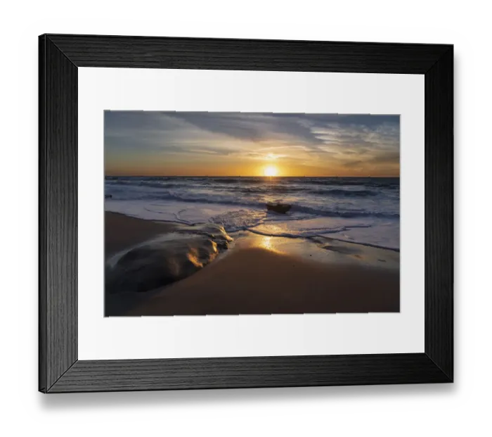 Framed Print : Sunset reflecting off the water on the sand of a beach Framed Print : Sunset reflecting off the water on the sand of a beach
