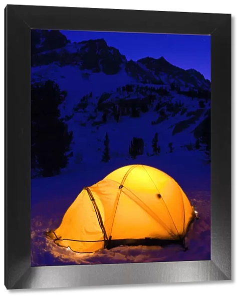 Yellow dome tent at night in winter, John Muir Wilderness, Sierra Nevada Mountains