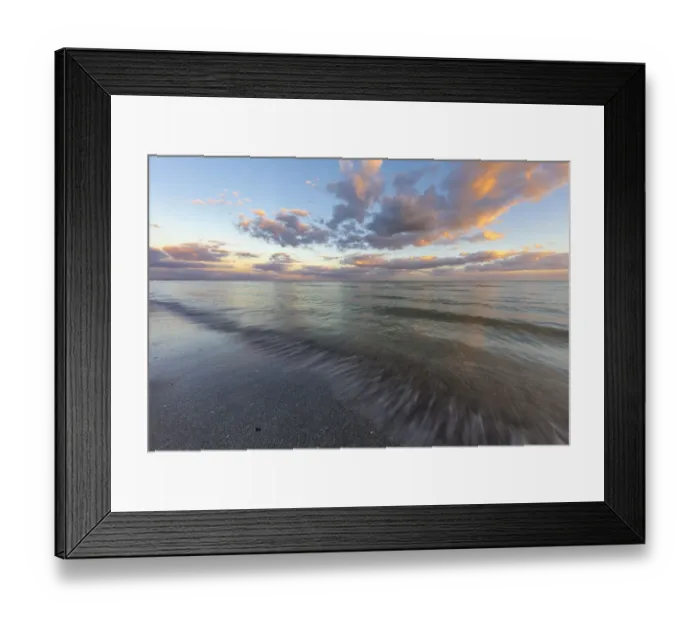 Framed Print : Sunset clouds over the Gulf of Mexico on Sanibel Island in Florida, USA Framed Print : Sunset clouds over the Gulf of Mexico on Sanibel Island in Florida, USA