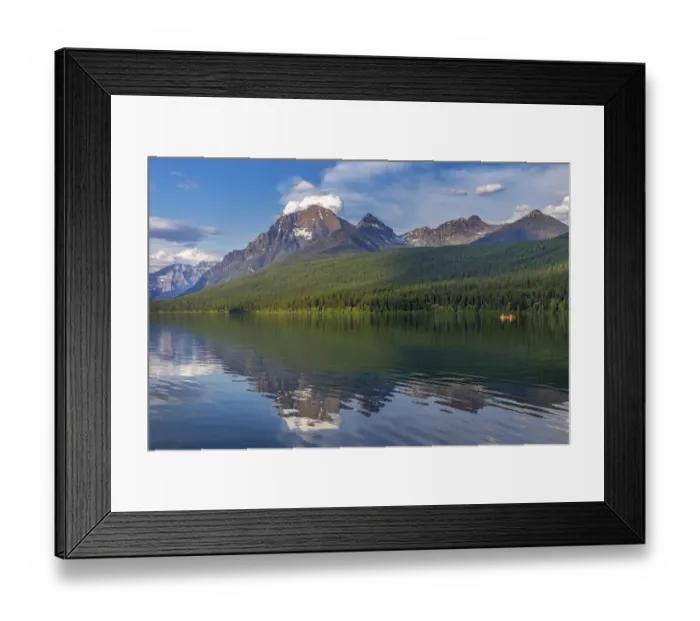 Framed Print : Fishing from a red canoe on the calm waters of Bowman Lake in Glacier National Park Framed Print : Fishing from a red canoe on the calm waters of Bowman Lake in Glacier National Park