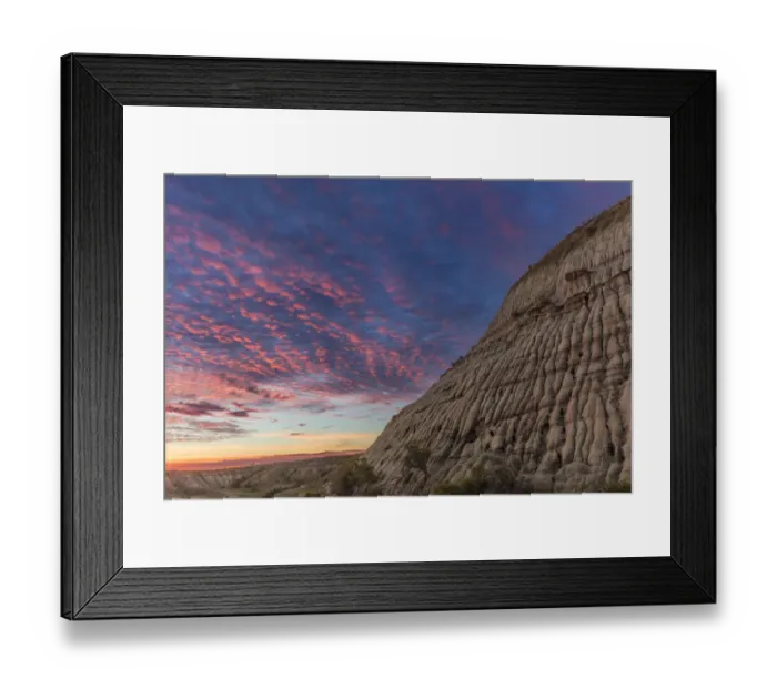 Framed Print : Vivid sunrise clouds over badlands formation in Theodore Roosevelt National Park Framed Print : Vivid sunrise clouds over badlands formation in Theodore Roosevelt National Park
