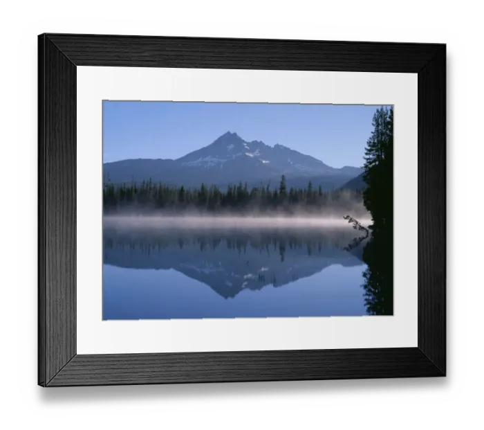 Framed Print : USA, Oregon. Deschutes National Forest, Broken Top reflects in the misty waters of Framed Print : USA, Oregon. Deschutes National Forest, Broken Top reflects in the misty waters of