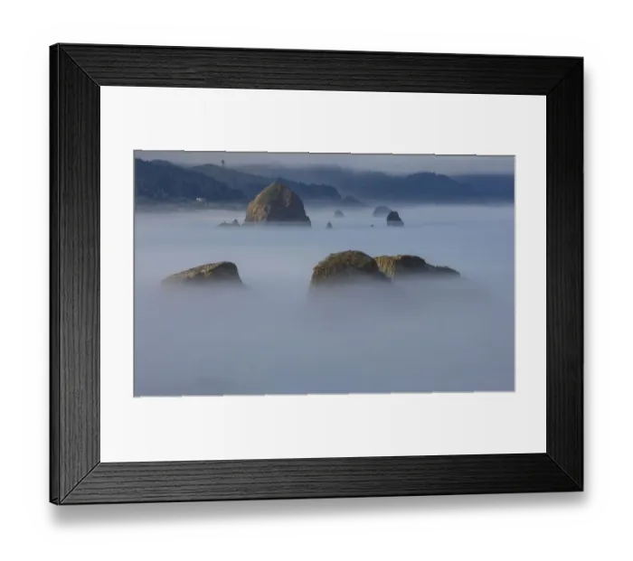 Framed Print : View of Cannon Beach with sea stacks with rising fog from Ecola State Park Framed Print : View of Cannon Beach with sea stacks with rising fog from Ecola State Park