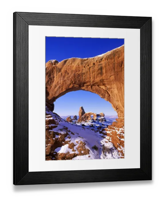 Framed Print : Morning light on North Window framing Turret Arch in winter, Arches National Park, Utah, USA Framed Print : Morning light on North Window framing Turret Arch in winter, Arches National Park, Utah, USA