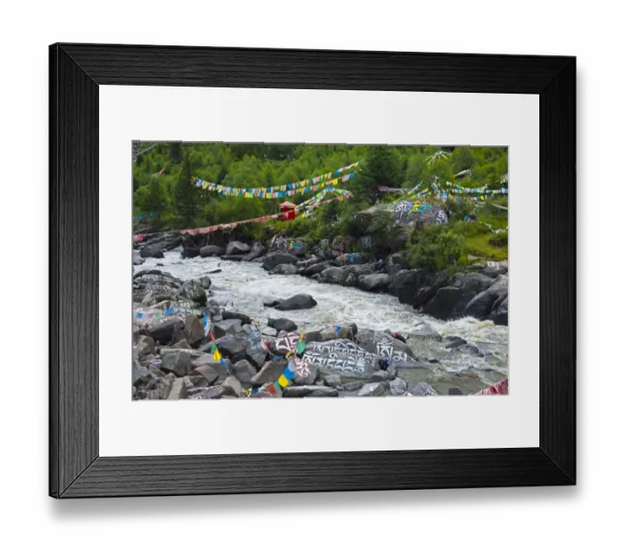 Framed Print : Buddhist words painted on rocks and praying flags by the river, Tagong, western Sichuan Framed Print : Buddhist words painted on rocks and praying flags by the river, Tagong, western Sichuan