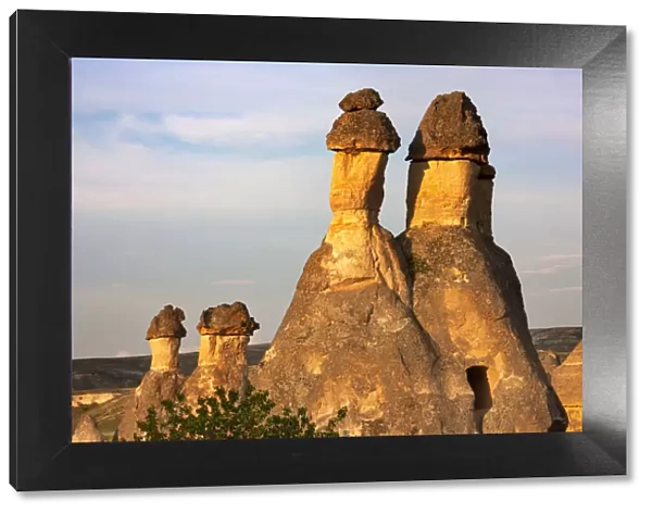 Fairy chimney rock formation in Goreme at sunset, Cappadocia (UNESCO World Heritage Site)
