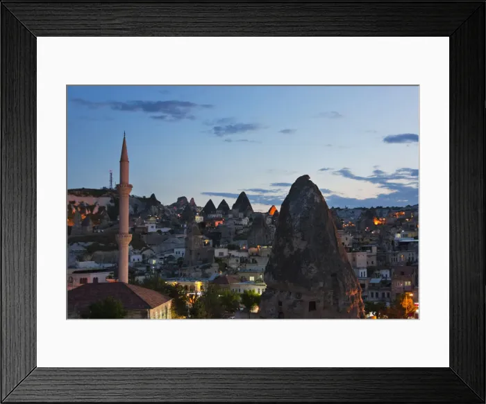 Framed Print : Houses and churches carved into the rock formations, Goreme, Cappadocia, Turkey