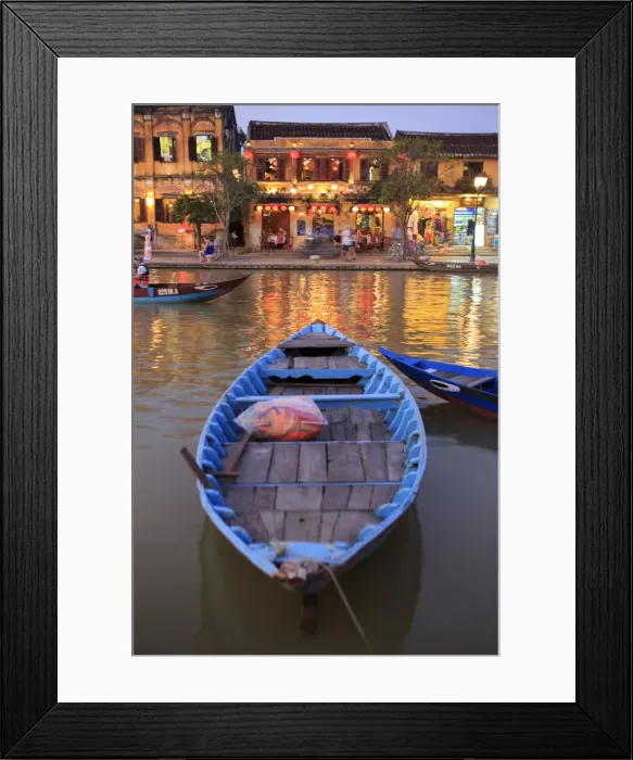 Framed Print : Wooden boats moored on the Thu Bon River opposite Bach Dang Street in the old town of Hoi An