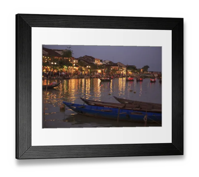 Framed Print : Wooden boats moored on the Thu Bon River opposite Bach Dang Street in the old town of Hoi An Framed Print : Wooden boats moored on the Thu Bon River opposite Bach Dang Street in the old town of Hoi An