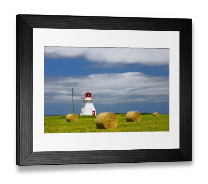 Framed Print : Canada, Prince Edward Island, Darnley. Lighthouse and farm bales Framed Print : Canada, Prince Edward Island, Darnley. Lighthouse and farm bales