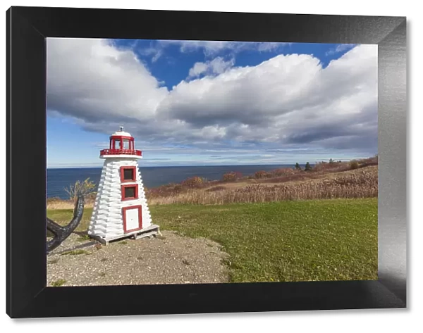 Canada, Quebec, L Anse-au-Griffon. Miniature lighthouse