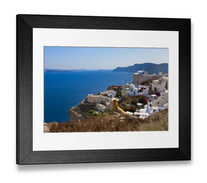 Framed Print : White houses on the coast of Aegean Sea. Oia, Santorini Island, Greece