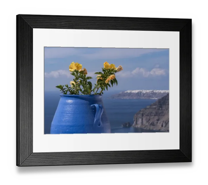 Framed Print : Greece, Santorini. Blue flower pot with hibiscus flowers juxtaposed again the rugged slopes Framed Print : Greece, Santorini. Blue flower pot with hibiscus flowers juxtaposed again the rugged slopes