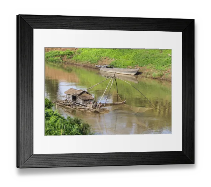 Framed Print : Kratie, Cambodia. Floating Vietnamese houseboat on the Mekong River in Kratie, Cambodia Framed Print : Kratie, Cambodia. Floating Vietnamese houseboat on the Mekong River in Kratie, Cambodia