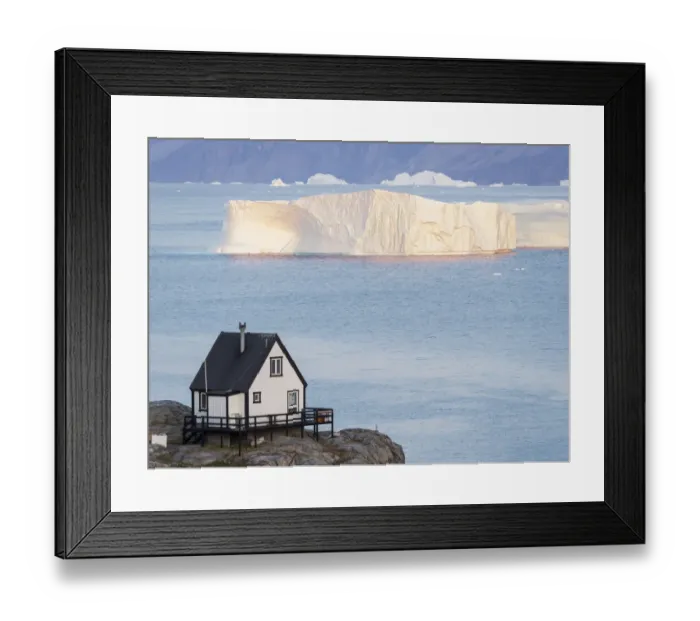 Framed Print : Small town of Uummannaq, northwest Greenland. Background the glaciated Nuussuaq