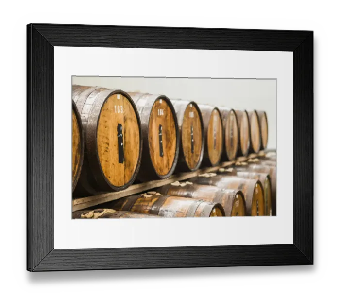 Framed Print : Portugal, Azores, Sao Miguel Island, Ribeira Grande. Mulher de Capote distillery, barrels